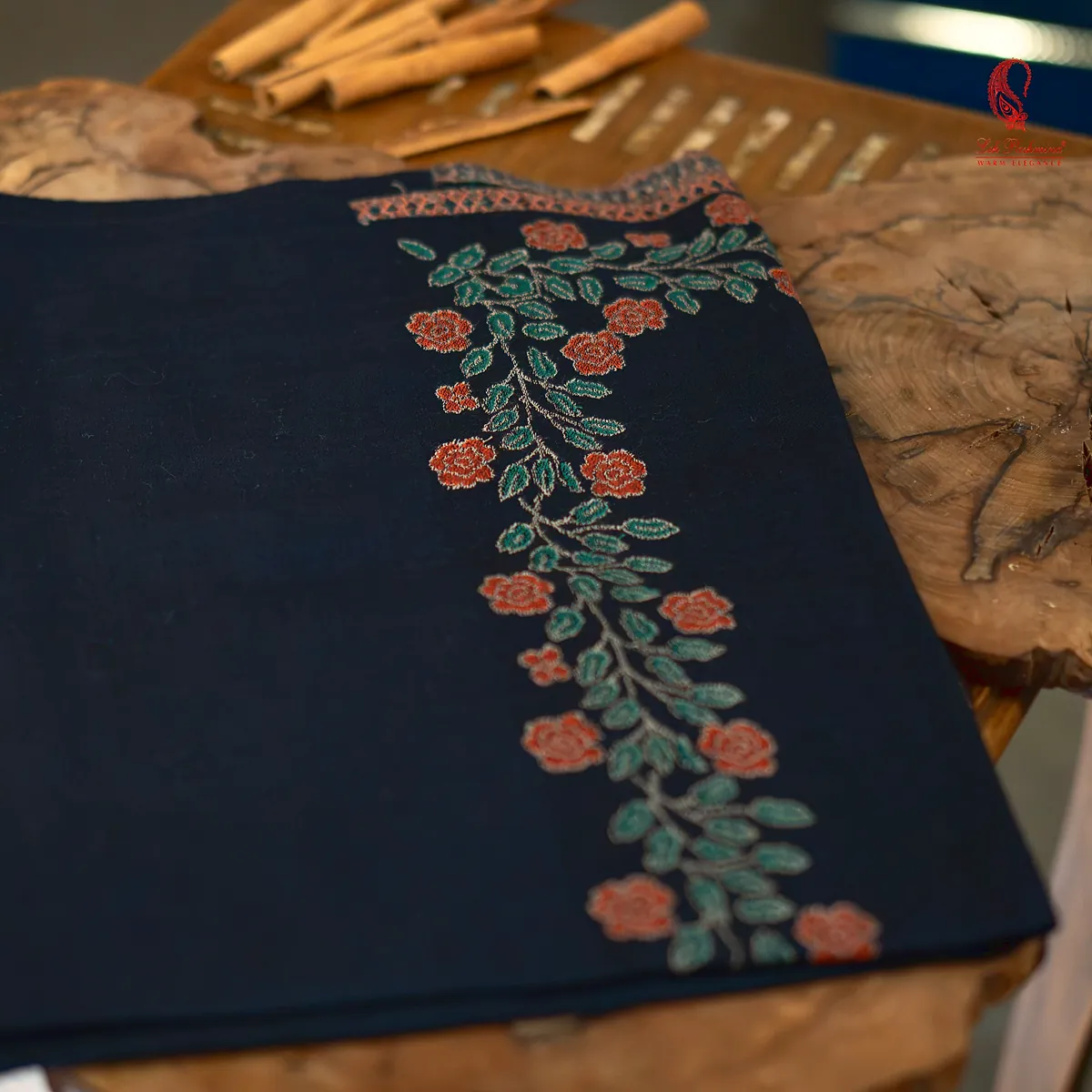 Black stole with a rose-vine border