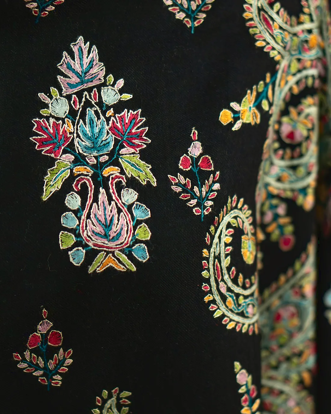 Floral embroidery on a black stole